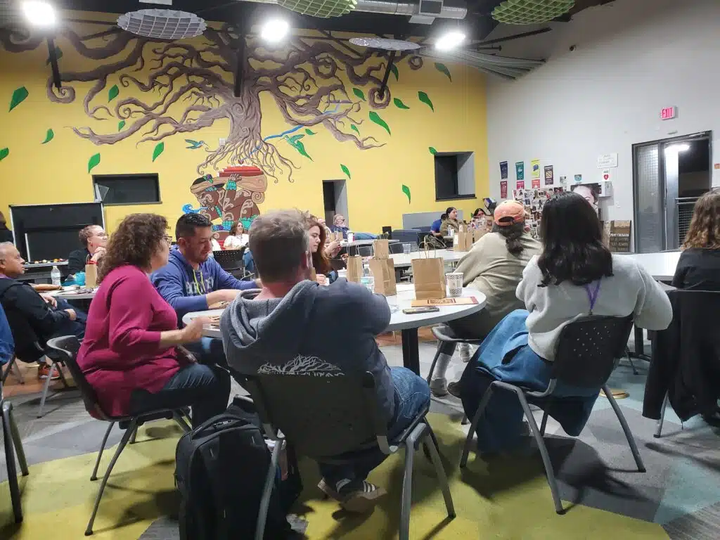 Border Southwest members sitting around tables